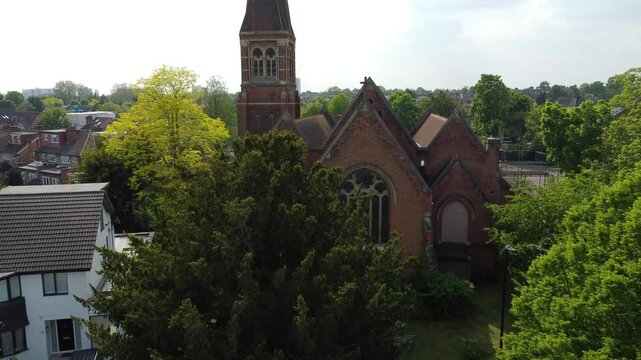 Drone shot of the St Dunstan's Episcopal church in East Acton district in Acton in London, England