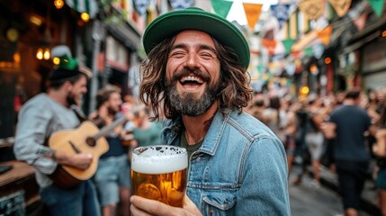 Joyful caucasian man enjoying a festive beer at outdoor street festival. Saint Patrick's Day, St Paddy's Day, St Patty's Day - Irish National Holiday and Cultural Celebration