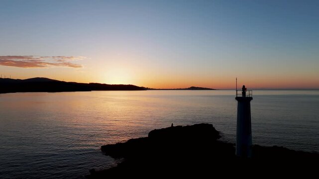 Fazo baliza do Lago And Calm Sea At Dusk in A Coru&ntilde;a, Spain. - aerial shot