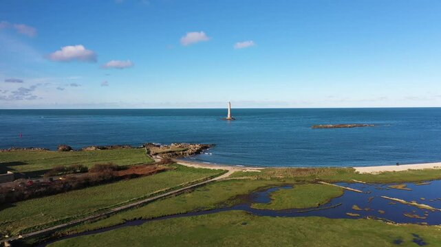Beautiful aerial shot of thee goury's fare in Normandy on a sunny day