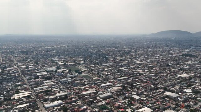 Soaring above Ecatepec on a gloomy, smog-filled day. Mexico