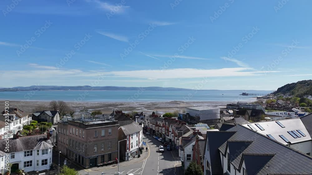 Wall mural Drone footage of the town of Larne on the east coast of County Antrim, Northern Ireland, UK