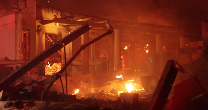 Altadena, California, USA - January 8, 2025: Aided by extreme Santa Ana Winds, the Eaton Fire destroys downtown Altadena.