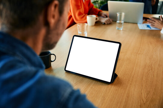 Businessman using tablet PC in office