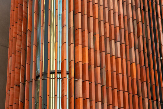 Modern building facade with geometric pattern in Krakow, Poland