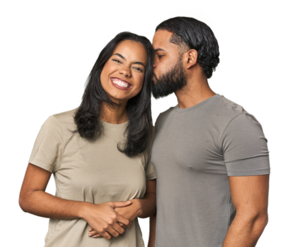 Latino couple in love embracing warmly in studio