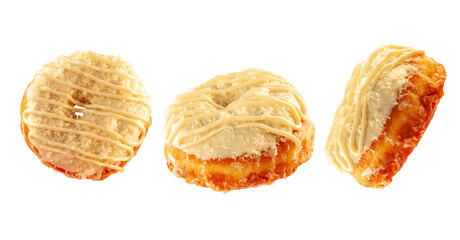 White chocolate brioche donut with caramel drizzle isolated on a white background in different angles and perspective.