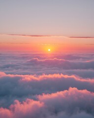 Naklejka premium Aerial View of Sunset Above Clouds with Bright Orange Sun