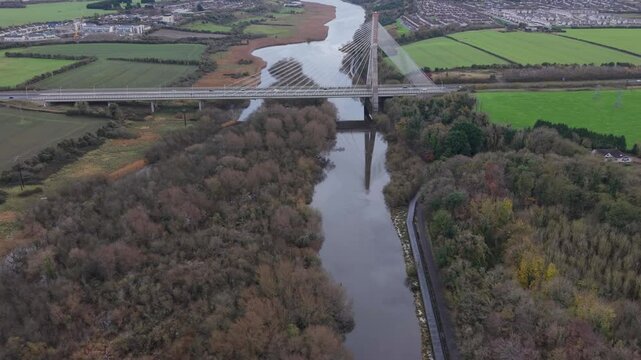 Mary mcaleese boyne valley bridge crossing lush fields and boyne river , aerial view
