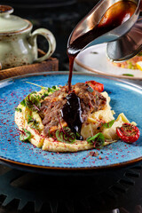 Hot and tasty dish with sauces