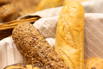 bread in wicker basket, baguettes close-up