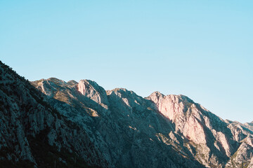 Scenic view of mountains and lake at dusk