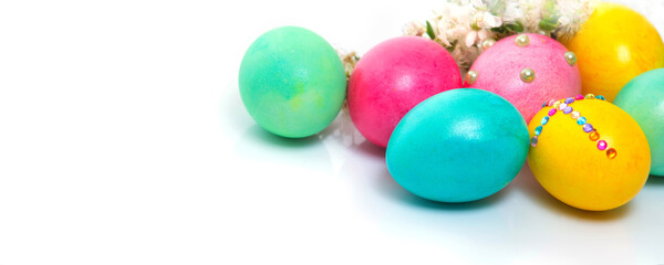 Easter eggs on white background close-up, banner