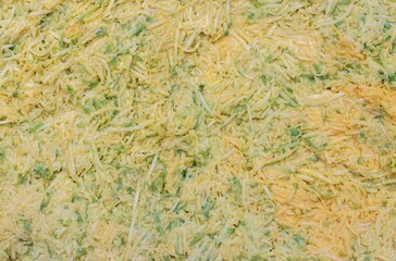 Grated Raw Mango Pulp Heap in Horizontal Orientation