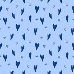 Seamless pattern featuring dark blue hearts on a light blue background, perfect for romantic designs, textiles, and Valentine's Day themes