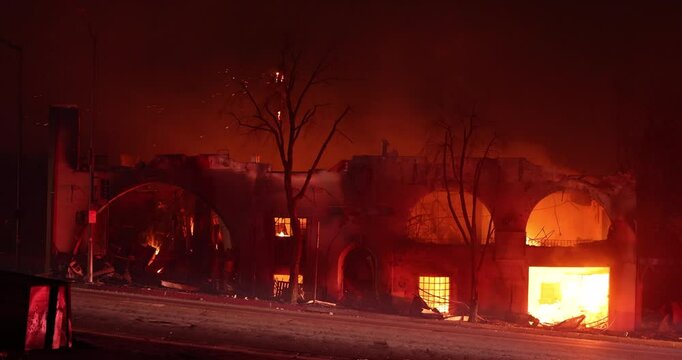 Altadena, California, USA - January 8, 2025: Aided by extreme Santa Ana Winds, the Eaton Fire destroys downtown Altadena.