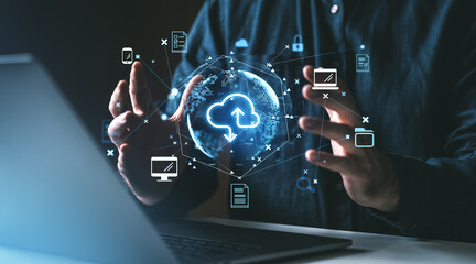 Hands interacting with digital cloud storage hologram.