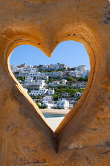 Peschici is a charming coastal town in the Apulia region of Italy, located on the beautiful Mediterranean Sea. It is a popular tourist destination known for its stunning beaches and clear water.