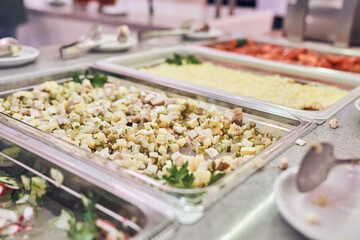 Selective focus on fresh vegetable salad. Dietary nutrition in metal containers with space for copying. High quality photo