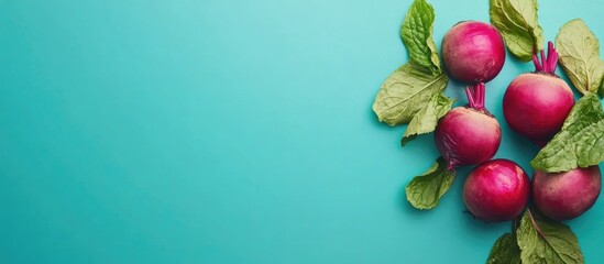 Vibrant Red Beetroots with Green Leaves on Mint Background Ideal for Culinary and Health Related Promotions