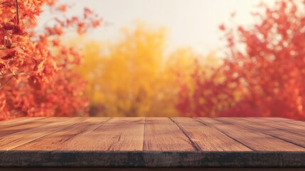 Rustic Wooden Table Against Blurry Autumn Bokeh Background in Shades of Red and Yellow