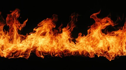 Fototapeta premium Vivid Close Up of Radiant Flames on Solid Black Background for Backgrounds and Visual Effects