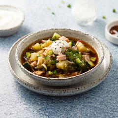 Traditional cold soup with ham and potato