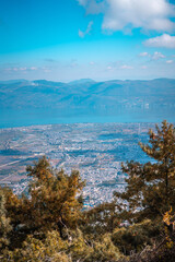 Here's a description and keywords for the image:

A breathtaking panoramic view from a mountaintop...