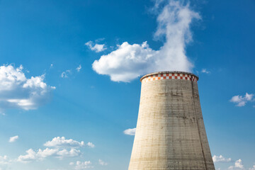 Cooling tower of a power plant emitting steam