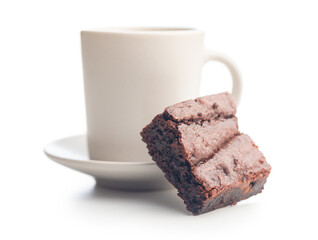 Homemade chocolate brownies and coffee cup isolated on white background.