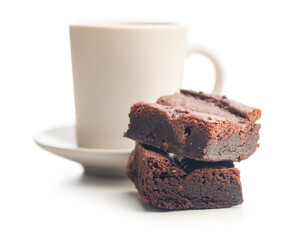 Homemade chocolate brownies and coffee cup isolated on white background.