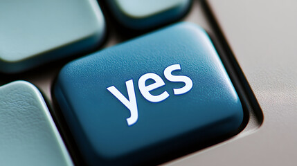 ecla de teclado de color azul con la palabra "yes" escrita en blanco en el centro. La tecla está resaltada y ligeramente inclinada, destacando su importancia y simbolizando afirmación, aprobación o ac