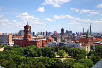 Berlin, Germany - July 9, 2024: View of central Berlin from the Berlin Cathedral, with Rotes Rathaus, the Nikolaiviertel, and iconic city landmarks under a clear summer sky.