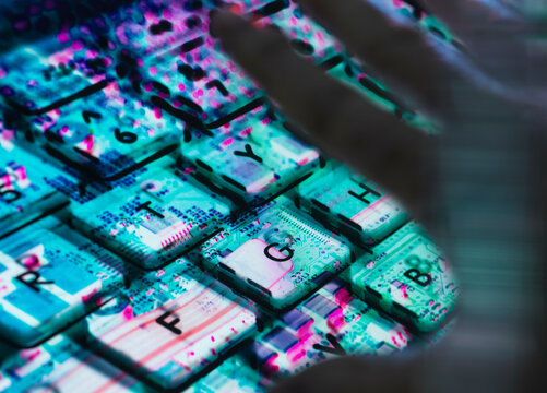 AI technology Landscape, Man typing at laptop with the computer hardware revealed underneath