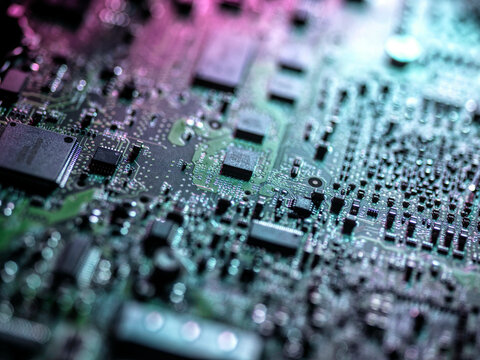 Close up of computer hardware with chips and electronic components 