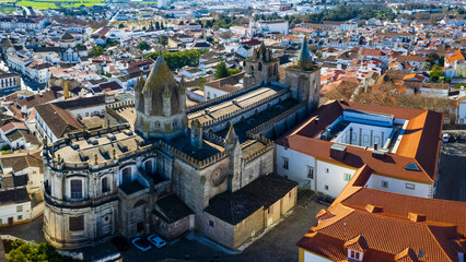 Portugal travel, medieval Evora town Unesco heritage site. Aerial panoramic drone view of down town and cathedral Santa Maria Assunta