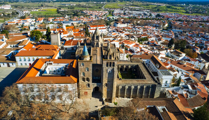 Portugal travel, medieval Evora town Unesco heritage site. Aerial panoramic drone view of down town and cathedral Santa Maria Assunta