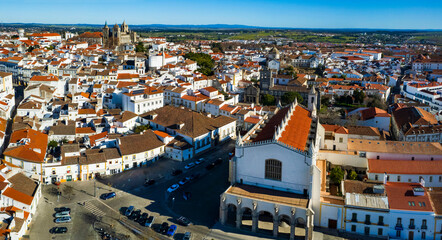 Portugal travel, medieval Evora town Unesco heritage site. Aerial panoramic drone view of down town , Bones Chapel in Sao Francisco Church and cathedral Santa Maria Assunta