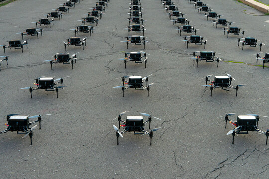 Row of drones arranged symmetrically on the ground, Zagreb, Croatia