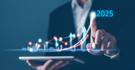 A person pointing a growth chart with 2025 labels on a tablet. Planning and growth, concept of...
