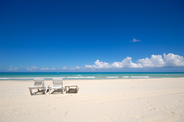 sunbeds and costline  at tropical beach