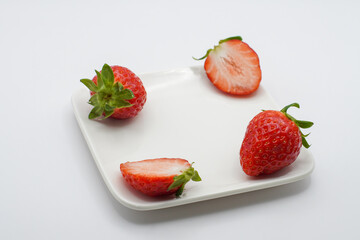 strawberries on a white plate