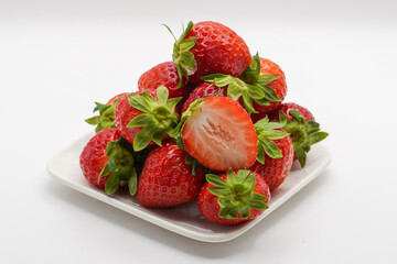 Red strawberry in a bowl