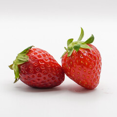 Two strawberries isolated on transparent background. Full depth of field.