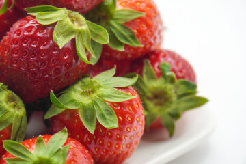 Red strawberry in a bowl