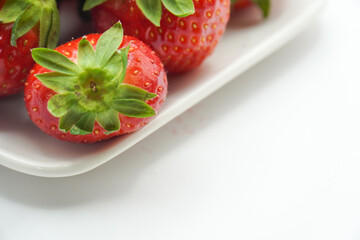 close-up of fresh strawberries on a plate