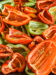 Green yellow red chopped sweet bell pepper, background