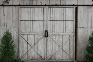 wooden barn gate with white color © herman