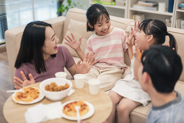 Young Asian family at home