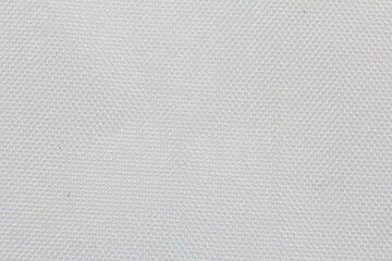 Closeup artificial leather white colour for texture background. top view.
